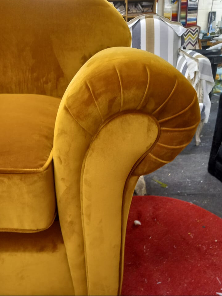 Arm of re-upholstered chair